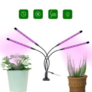 Une lampe led à 4 bras qui illumine des plantes à gauche et à droite.Sur fond blanc.